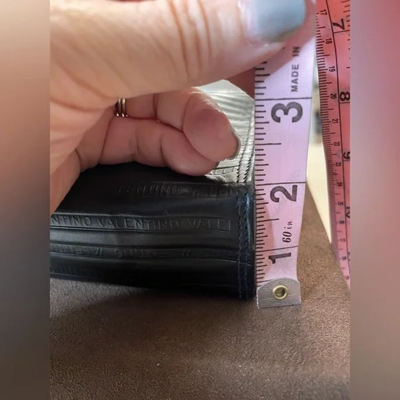 Mario Valentino Black and Gold Clutch with Elegant Wristlet